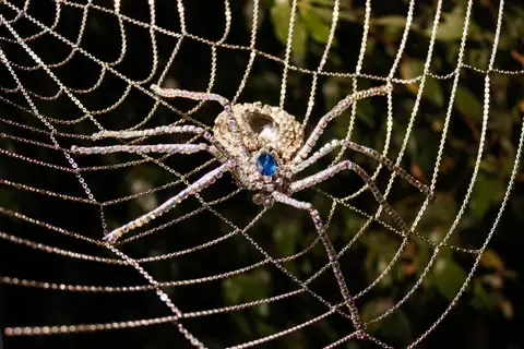 Rhinestone spider on a chain web