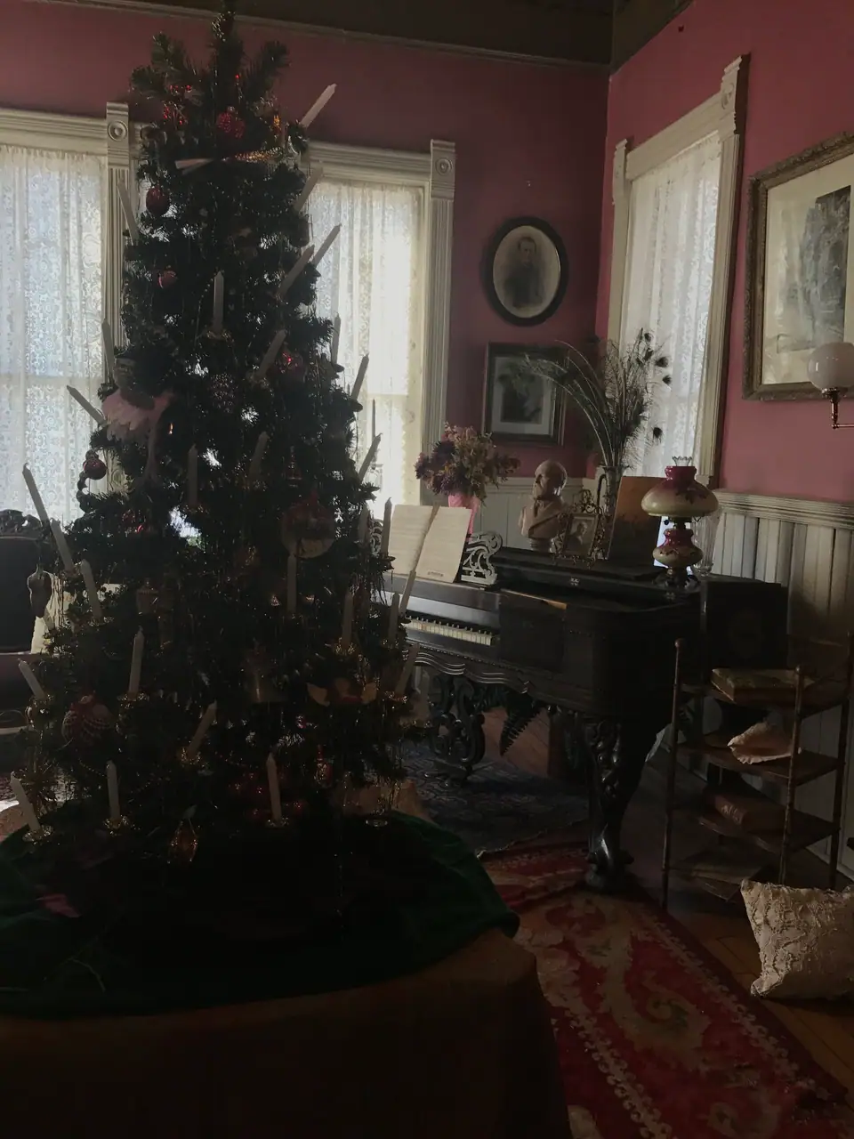 Christmas tree with candle tapers in the Victorian parlor of the Old Depot Museum